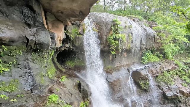 Waghbil cave waterfall or Tiger's cave waterfall at near Mumbai, Maharashtra