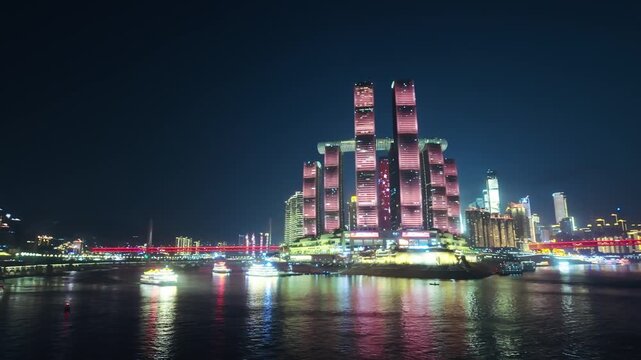 Raffles City Chongqing Complex At Night In Chongqing, China. - wide shot