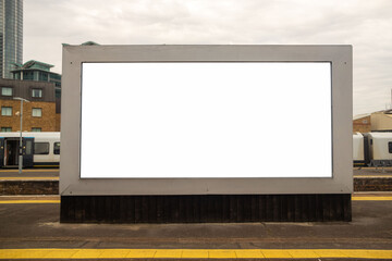 Fototapeta premium LONDON - blank advertising hoarding on train station platform
