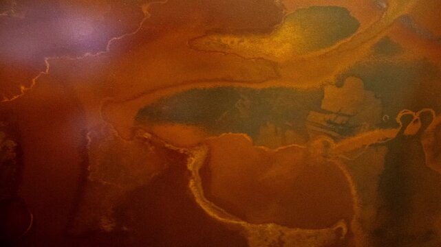 Slow Pan Across Abstract Iron Oxide Rust Texture with Dark Mineral Formations in 4K