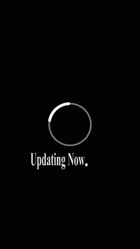 Updating text animation with loading circle. Updating text digital system progress. Updating text technology graphic on black background for software updates.