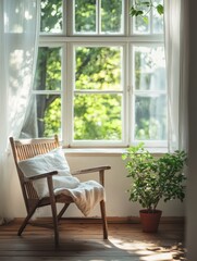 Fototapeta premium Wooden armchair with white cushions by a sunlit window overlooking green trees