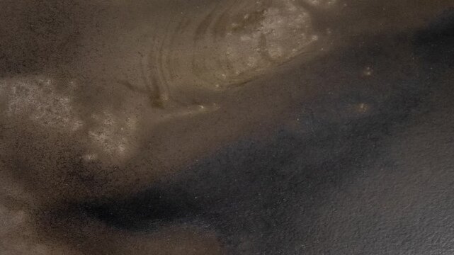Slow Pan Across Dark Bronze Patina Texture with Abstract Metallic Surface in 4K