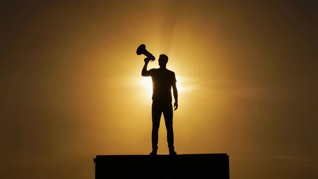 Dramatic Silhouette of Man Standing on Elevated Platform Holding Megaphone Against Golden Sunset, Cinematic Full HD Wide Shot