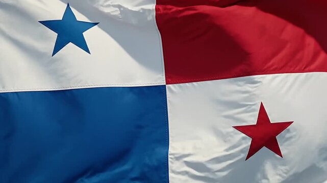 Close up of the national flag of Panama waving gently in the wind showing its distinct quadrants of white blue and red with stars