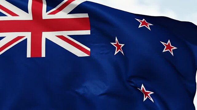 Waving flag of New Zealand with the Union Jack and the Southern Cross constellation prominently displayed on a blue background