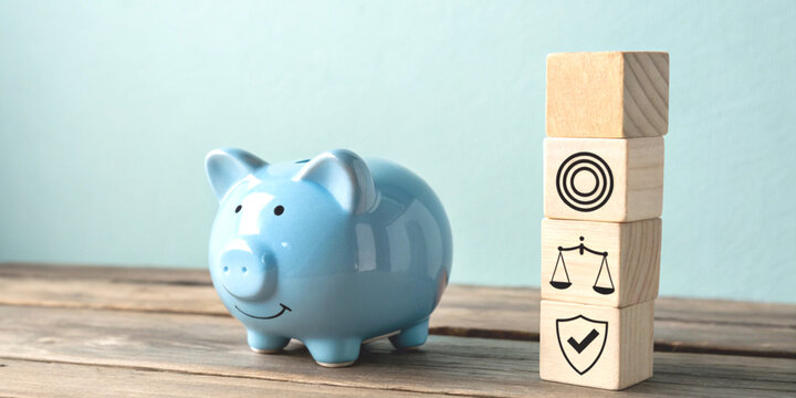 Managing financial risks with a piggy bank next to the safety symbol and balancing life and goals