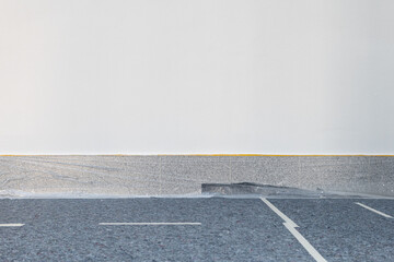 Ground floor and wall prepared for a paint job. Close-up of the masked baseboard covered with plastic foil and tape. A fleece cover protects the flooring against color spots. © Felix Geringswald