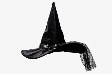 Fototapeta premium Black velvet witch hat with lace veil, pointed halloween costume accessory, dark gothic headwear for masquerade party isolated on white
