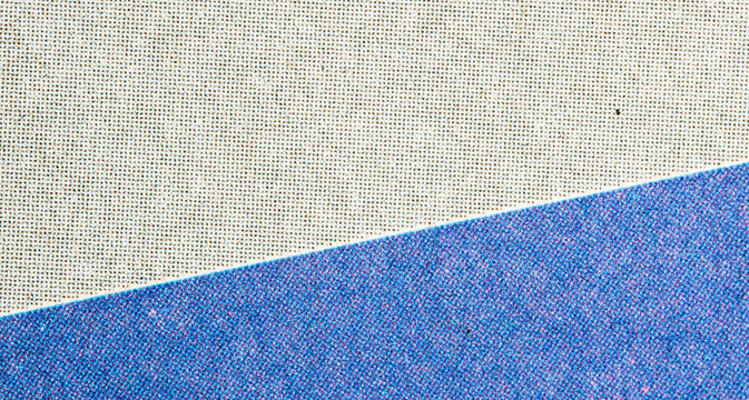 Macro Newspaper Print Paper With Blue Diagonal Block