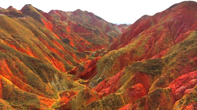 Tectonic movement, Uplift and erosion, Strata deformation, Geological timescale, Sedimentary layers, Folded rock beds, Natural sculpture by earth, Crustal movement痕迹, Millennial formation, Rock foldin