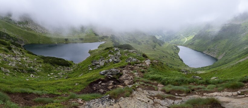 Wisps of mist drift over Kaltenbachsee, Schladminger Tauern, S&ouml;lkt&auml;ler nature park Park, St. Nikolei, Styria, Austria