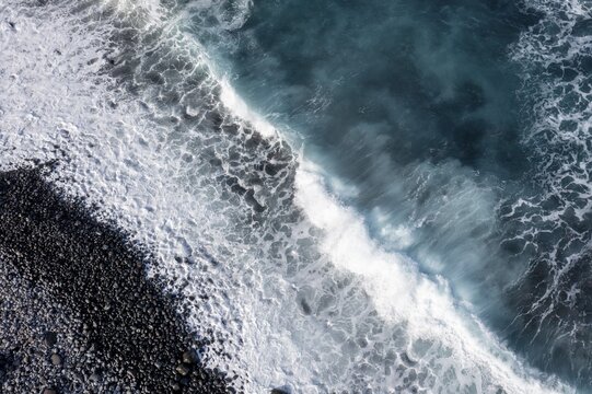 Waves on the beach, turquoise sea and black pebble beach, aerial view, La Gomera, Canary Islands, Spain