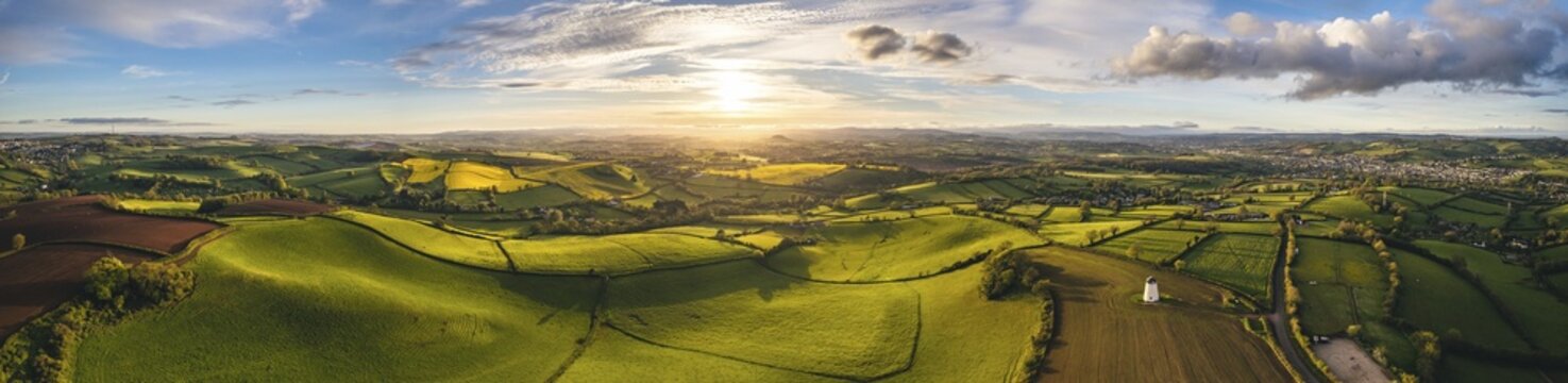 Sunset over Devon Windmill from a drone, Fields and Farms, Torquay, Devon, England, United Kingdom