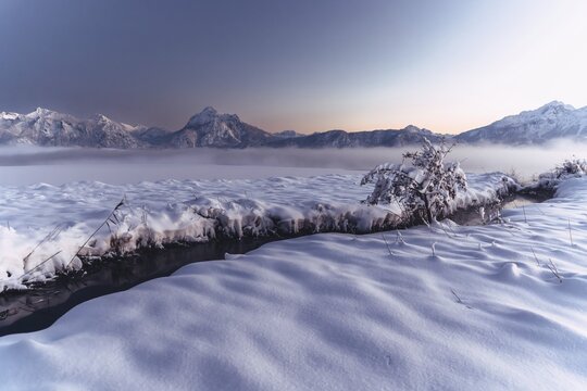 Shortly after sunset, twilight at Lake Hopfensee in the Allg&auml;u in Bavaria in a winter landscape, Germany