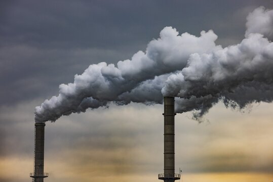 Pollution, industry, smoke pouring out of a factory chimney, Lenzing, Upper Austria, Austria