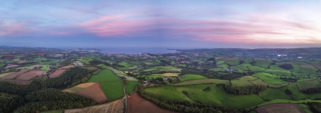 Twilight Sky of Torbay farms and fields from a drone, Totnes, Berry Pomeroy, Devon, England, United Kingdom