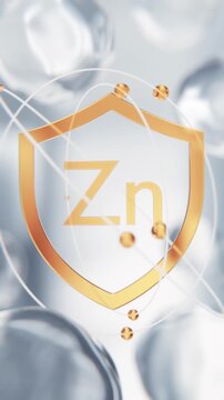 Zinc Zn mineral golden shield symbol in 3D animation. Trace element molecular structure abstract background with transparent liquid cells for medical, immune defense and chemistry video