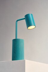 Obraz premium Modern minimalist wall-mounted reading lamp with turquoise metal arm and base, emitting warm ambient light against neutral background, contemporary interior design accent lighting