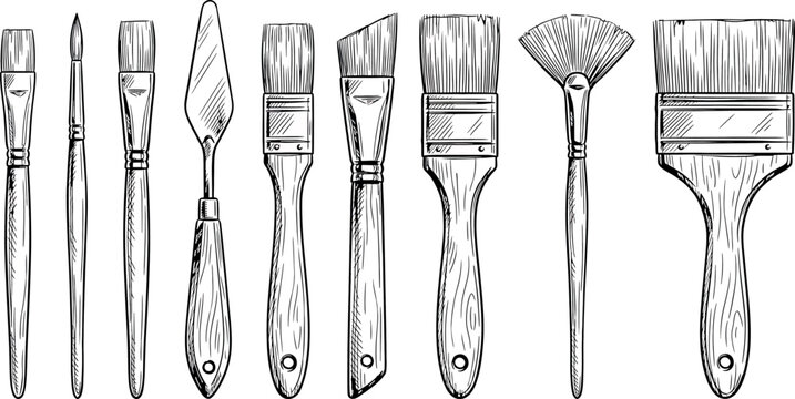 Set of various artist brushes and palette knife isolated on white background