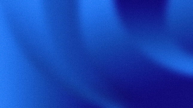 A serene blue fabric gently swirls in a soft focus close-up view.
