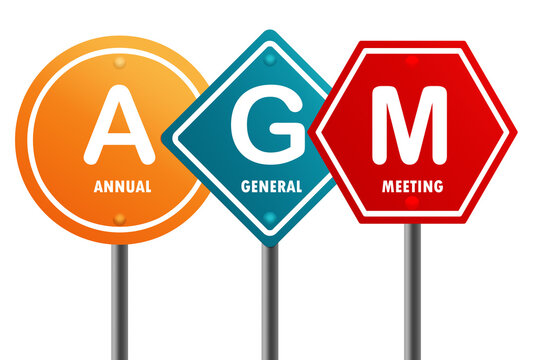 Road sign with AGM Annual General Meeting word