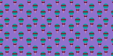 Obraz premium Seamless pattern of cute green lollipops with brown stripes, pink sticks, and little bows on a purple background. Perfect for candy-themed wallpapers, textiles, wrapping paper, and sweet backdrops.