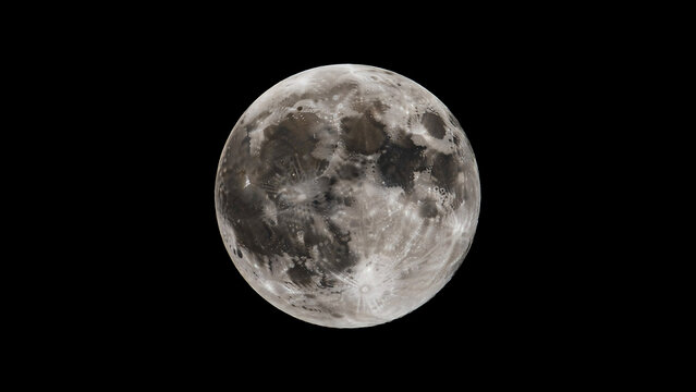 Full moon against a black background, lunar surface details craters gray