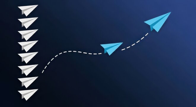 Leadership and Innovation Concept with Blue Paper Planes Breaking Away from the Group on Dark Background