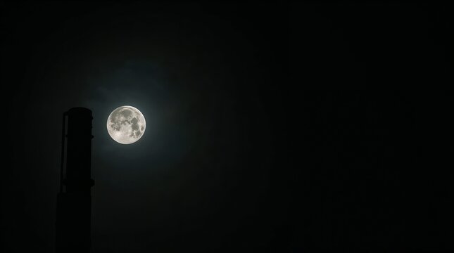 Industrial chimney silhouette with bright full moon at night concept