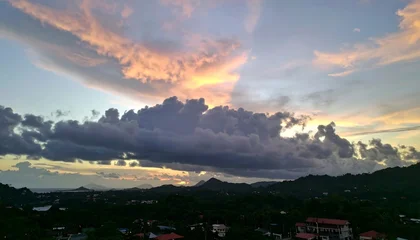 Dramatic sunset over hills © tanganbelang