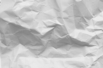 Fototapeta premium White Crumpled Paper Texture Background,Macro,A high-resolution close-up of a white crumpled paper texture, featuring intricate creases, folds, and shadows, perfect for artistic backgrounds and design