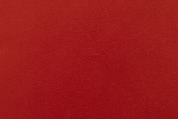 Fototapeta premium Solid Red Paper Texture Background,Macro,A high-quality, close-up texture shot of a solid, deep red paper surface, perfect for use as a minimalist background or graphic design element.