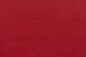 Fototapeta premium Solid Red Paper Texture Background,Macro,A high-quality, close-up texture shot of a solid, deep red paper surface, perfect for use as a minimalist background or graphic design element.
