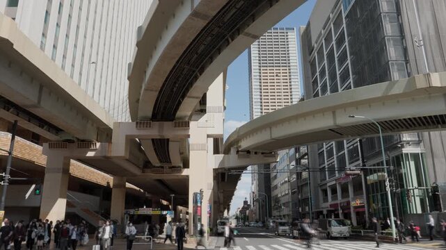 Tokyo Scene  :  Traffic Lights Changing at the Intersection of an Arterial Street, Skyscrapers and Expressway Junctions Intertwining Overhead, Layers of Tokyo  |  Ikebukuro, Tokyo, Japan