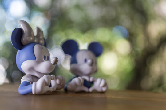 Bangkok, Thailand - June 16, 2026 : Character Disney 100 Mickey Mouse and Minnie Mouse. Love Hand Mini Bust