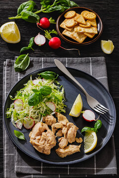 Premium Cod Liver served with salad and crackers