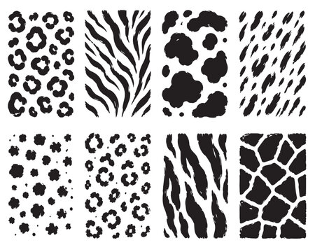 Abstract animal fur pattern vector set. Bold black spot textures with hand drawn crayon details, swirling brush strokes and organic skin silhouette elements.