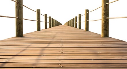 Obraz premium Long wooden bridge with rope railing on white background