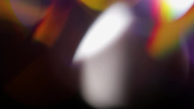 Abstract colorful blurred light effects with gradient hues and soft glow transitions