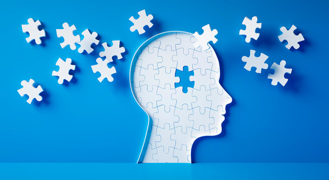 Conceptual artwork showing a 3D silhouette of a head surrounded by group of puzzle pieces, symbolizing mental input, activity, intelligence, or creativity - 3D illustration on blue background