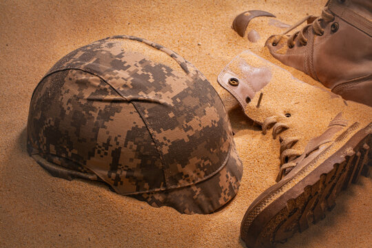 Scattered on the sands of time, the soldier&rsquo;s gear stands as a tribute to bravery and loss, blending with the desert wind that carries forgotten echoes of war. Silent Memories of War.