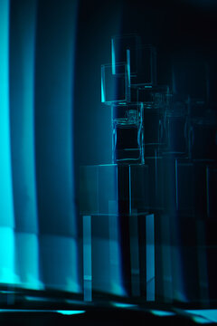 Abstract figures holding a perfume bottle glow with blue light