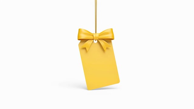 Yellow blank gift tag with a matching ribbon bow hanging on a string