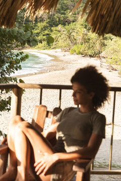 Relaxing on the shore in Tayrona, Colombia with a view of the beach