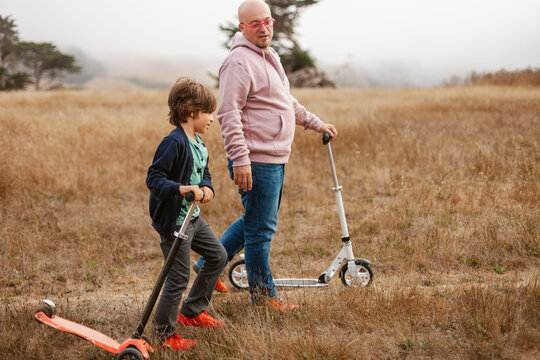 Father Son Scooter Walk