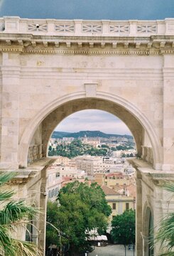 City of Cagliari Seen Through a Classical Triumphal Arch