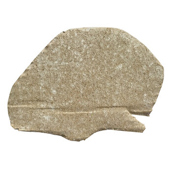 Rough irregular shaped stone or mineral fragment on neutral background