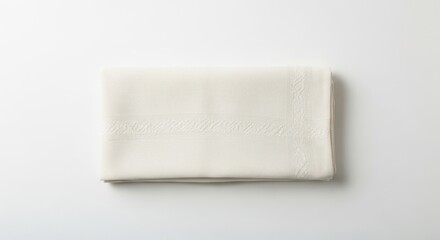 Fototapeta premium Clean White Fabric Folded on White Background, Soft Textile, Minimalist Design