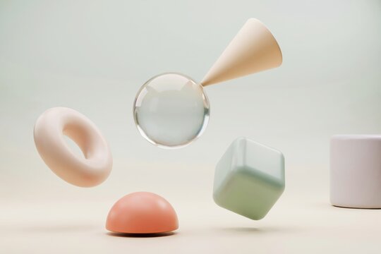Floating geometric shapes including a glass sphere, cone, torus, cube, and hemisphere in pastel colors against a soft neutral background